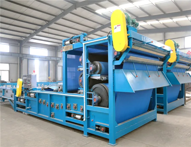 Belt filter presses assembled in a row in the production hall before shipment
